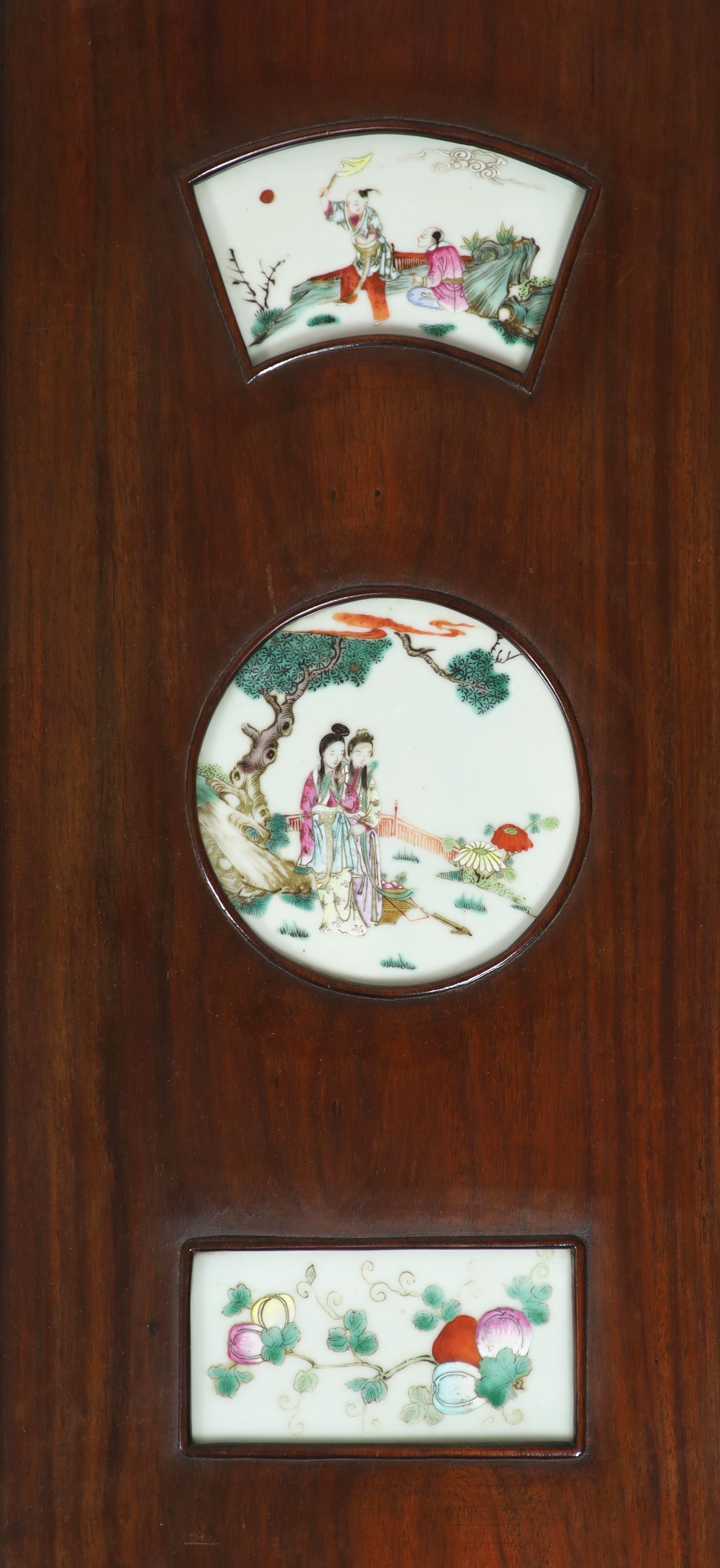 A Chinese porcelain mounted hardwood four fold screen, mid 19th century, Total size 127cm high x 122cm wide